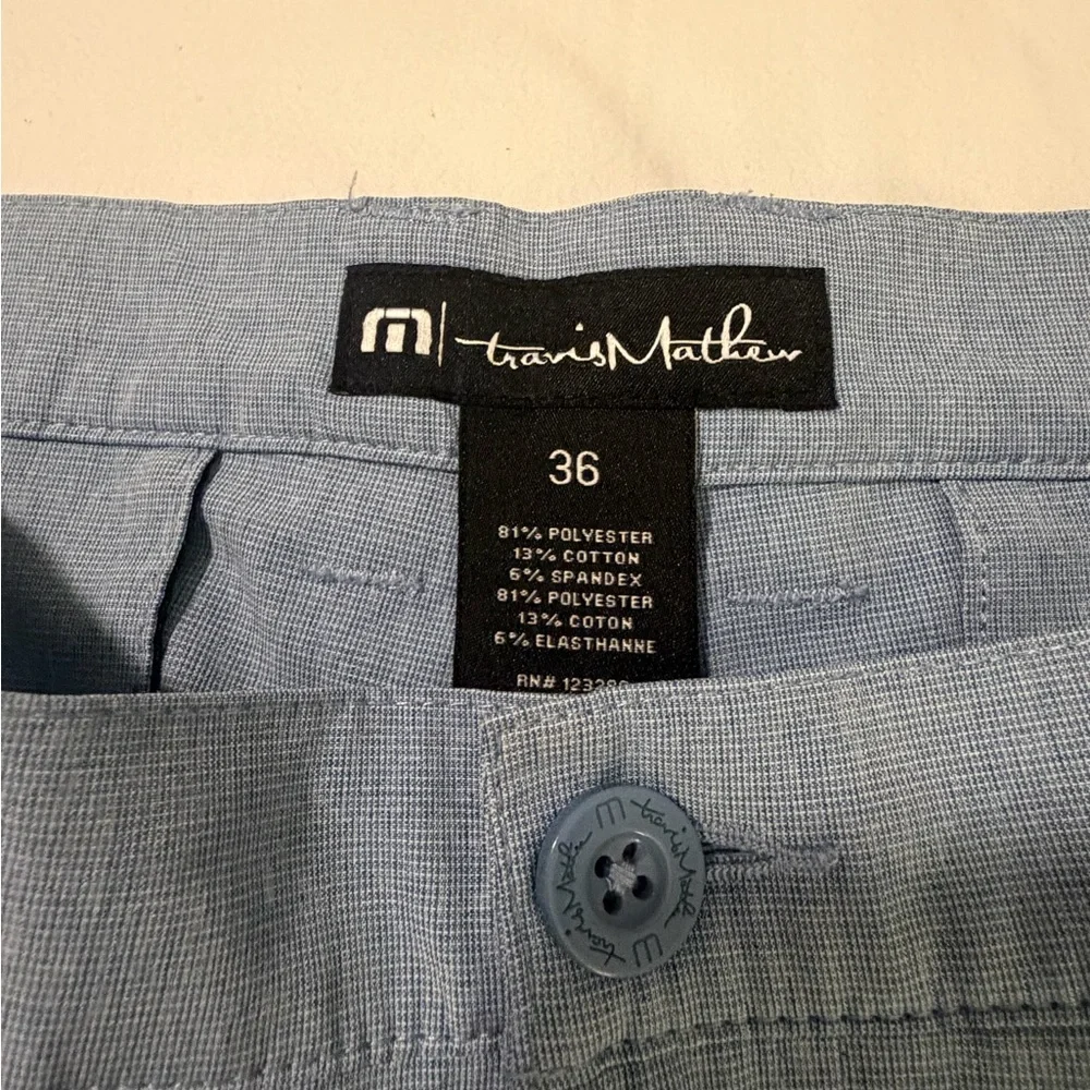 Travis Mathew “Beck” Light Blue Flat-Front Performance Shorts
